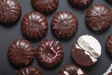 Background from marshmallows. Broken, cut, cracked, whole