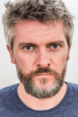 Fototapeta premium Gray hair, blue eye, 40 year old man portrait