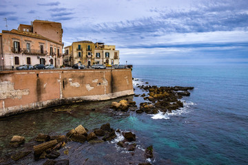 Fototapeta na wymiar Coast line of Ortigia island at city of Syracuse, Sicily