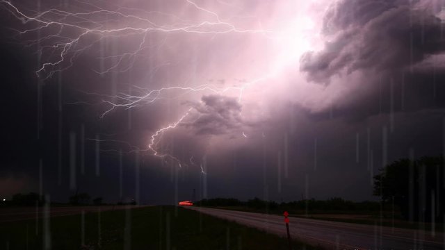 Cinemagraph of storm over country road with lightning