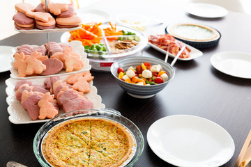 Easter cookies, caprese salad, and veggie tray