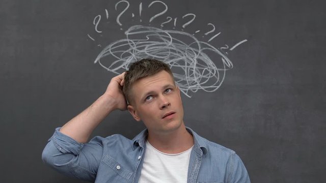 Confused man thinking and scratching head, developing idea, new project, startup