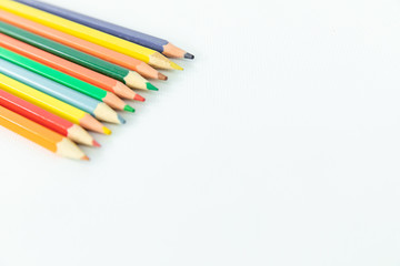 Color pencils on a white background isolated. Copy space
