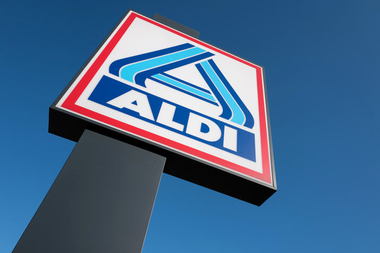 BERGNEUSTADT, GERMANY - October 30, 2016: Aldi sign (north division) against blue sky. Aldi is a leading global discount supermarket chain with almost 10,000 stores in 18 countries.