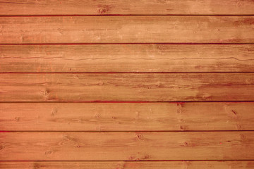 Orange, red wooden background texture. Horizontal planks, bars