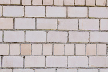 Old white brick wall. Close-up. Horizontal view. Background. Texture.
