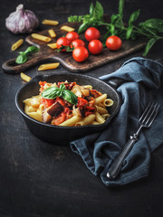 Pasta alla norma. Traditional Sicilian pasta dish with eggplant and tomato sauce.