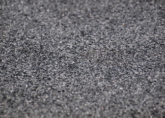 Mineral, asphalt, roofing felt on roof. 