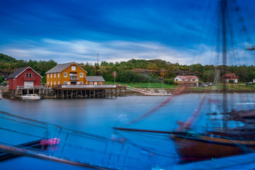 Fototapeta na wymiar Long exposure of the harbor in Lysoysund in Norway. 