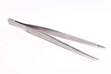 anatomical tweezers isolated on white background