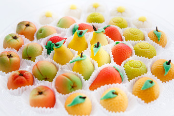 Marzipan on glass tray in white background