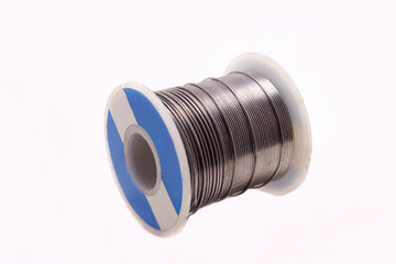 Spool of soldering alloy isolated on the white background