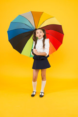 On way to school. Fashion accessory. Rainy september. Accessory for rainy day. Fancy schoolgirl. Girl with umbrella. Rainy day. Happy childhood. Kid happy with umbrella. Fall weather forecast
