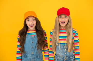 Happy girls. Friendly and happy children. Family look. Stylish children. Universal childrens day. Promote international togetherness awareness among children worldwide and improving childrens welfare