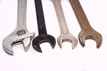 Old rusty wrenches, spanners set isolated on white.
