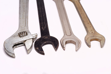 Old rusty wrenches, spanners set isolated on white.