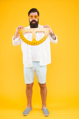 Maintain beard shape. Bearded nerd with protractor. Exploring properties of protractor. Brutal...