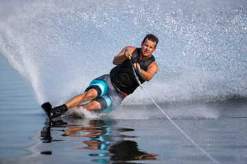 A slalom waterskier carving a turn.