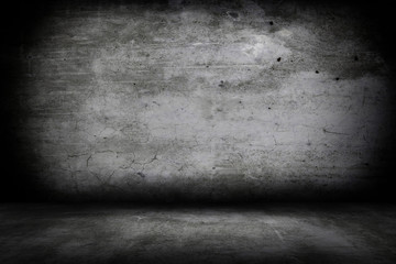 Grunge interior room with concrete wall and floor. Empty concrete space.