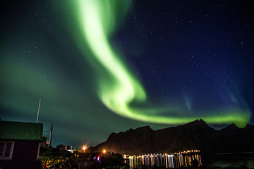 Northern lights above Reine in Lofoten islands in Norway