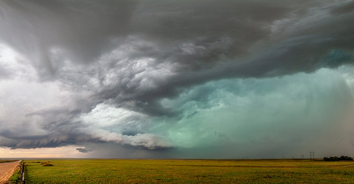 Dramatic Sky And Clouds With Hail And Green Sky