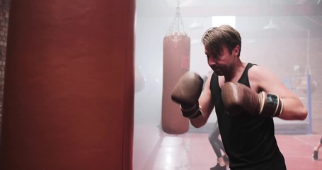 Adult male in a boxing fitness class