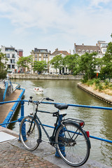 Fototapeta na wymiar bicycle in bridge over river