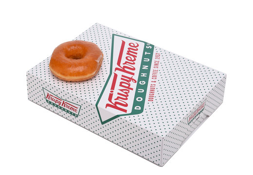 IRVINE, CALIFORNIA - JANUARY 24, 2016:  Krispy Kreme Doughnut Box. Krispy Kreme Doughnuts is a global doughnut company and coffeehouse chain.