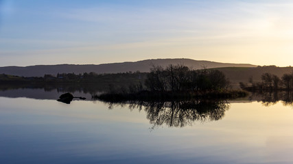 Hills and islands reflected in Lough Corrib