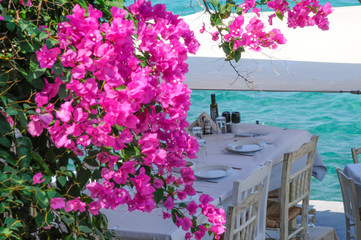 Fototapeta na wymiar tavern on the beach in mediterranean landscape