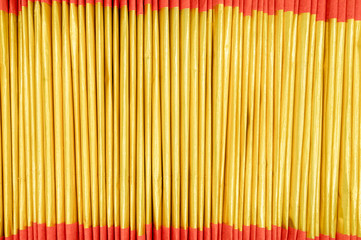 Close-up Joss Paper (ghost or spirit money) that made into burnt offerings common in Chinese ancestral worship on Ghost Festival. Abstract pattern background.