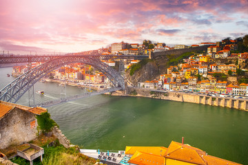 Porto Cityscape on the Douro River and Dom Luis I Bridge at Sunset