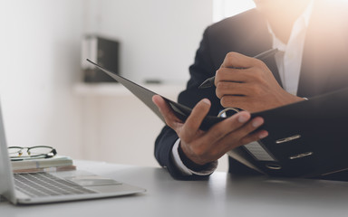 Image of businessman working at work table,home office desk background, Desk musicians,checklist...