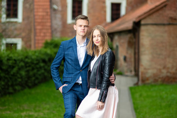 Fototapeta premium Portrait of Fashionable and Elegant Caucasian Couple Together Outdoors.