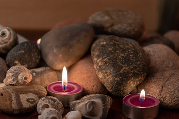 energetic stones, soft light and aromatic candles for yoga session