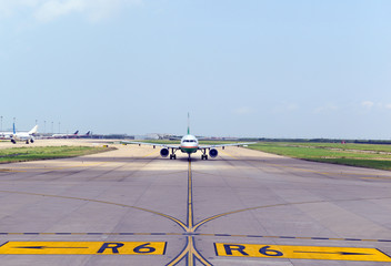 Fototapeta na wymiar Commercial jet airplane on tarmac at airport