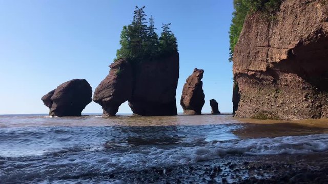 High Tides crash against the shore at Bay of Fundy