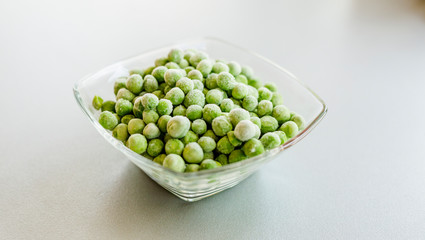 Frozen pea in glass bowl