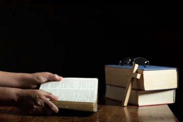 Bible on wooden background