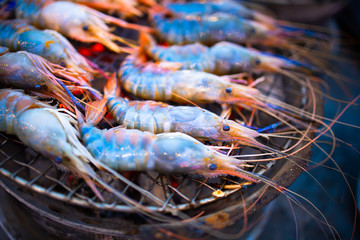 Grilled shrimp on a charcoal stove