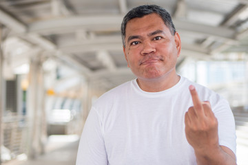 angry old man showing rude, vulgar middle finger gesture