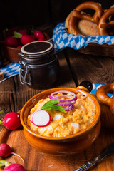rustic Bavarian obazda with radishes and onions