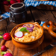rustic Bavarian obazda with radishes and onions