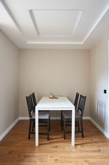 Minimalist composition with sugar, salt and pepper on a white dining table