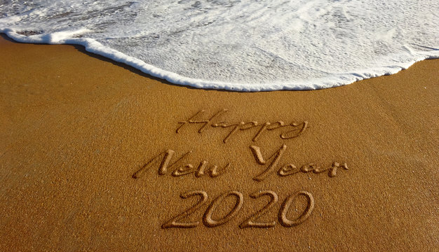 2020 Happy New Year Sand Text. Photo Image
