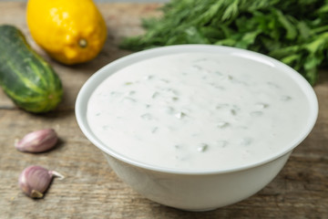 Tzatziki sauce made of yogurt, cucumbers, garlic and olive oil. National Greek cuisine. 