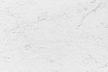 Texture of a concrete wall with cracks and scratches which can be used as a background