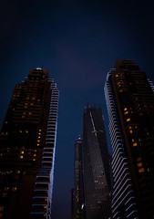 Fototapeta na wymiar View of the high-rise buildings of Dubai in the evening. Dubai Marina district.