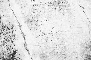 Texture of a concrete wall with cracks and scratches which can be used as a background