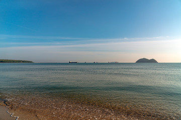 The seaside and blue sky in the morning with beautiful sunshine.